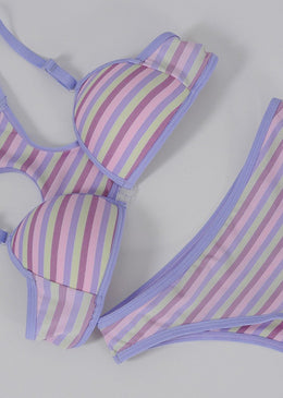 Conjunto juvenil de microlight listrada multicolor. O soutien é microlight listrada multicolor, nadador, com bojo cortininha, viés liso, alças finas feitas do próprio viés, reguláveis... 