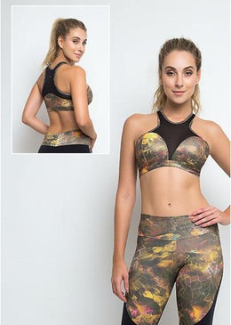 Top Fitness fabricado com o tecido Point de Ouro com leve aplicação de brilho dourado, uma exclusividade da Santaconstancia para D'JM Fitness.Modelagem desenvolvida para dar... 