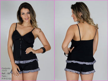 Short doll confeccionado em liganete lisa com barra estampada. Composição:96% polieste 4% elastano 