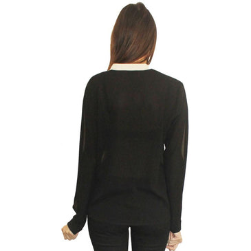 Blusa dupla em semi transparência, confeccionada em tecido 100% poliester, para garantir a versatilidade da peça. Lisa, com mangas longas, acabamento em costura no tom, fechamento... 