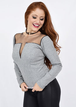Blusa manga longa fabricado em tecido de malha ribana com detalhe de tule frente e costas Composição 96% Poliéster 04% Elastano tule 100% Poliamida 