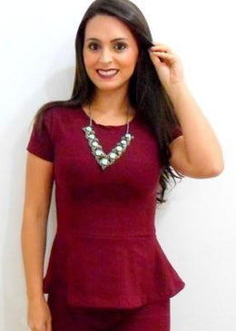 Blusa peplum no tecido bandagem.Tecido Texturizado com elastano. Efeito modelador. com corte sofisticadoTamanhosP ( Veste 36/38)  Comprimento 55 CmM ( Veste 40)  Comprimento 56 CmG... 