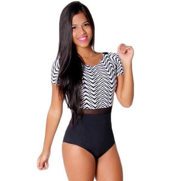Body em poliamida Santa Constância sem bojo com detalhe em tule. 
Composição: 90% Poliamida e 10% Elastano
Marca: Carioca Fit 