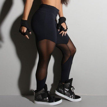 Calça fitness fusô  em suplex de poliamida Santa Constância com detalhe em tule nas pernas. Marca: Carioca FitComposição: 90% Poliamida e 10% Elastano 