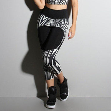 Legging lisa com detalhe estampado e saia tapa bumbum na mesma peça.Marca:Carioca FitComposição: 90% Poliéster e 10% Elastano 