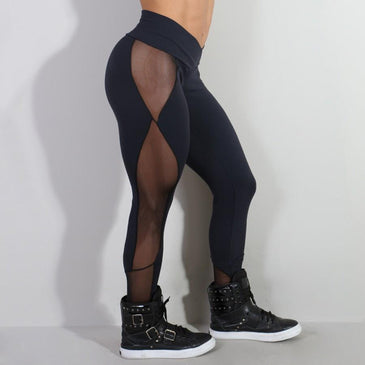 Calça fusô fitness  poliamida lisa Santa Constância com recortes em tule e cós transpassado Marca: Carioca FitComposição: 90% Poliamida e 10% Elastano 