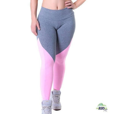 Calça Fusô  em Suplex de  Poliamida com recorte em tela rosa. Cós duplo de altura média.  Marca: Carioca FitComposição: 90% Poliamida 10% Elastano 