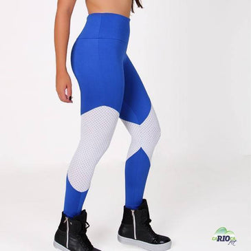 Calça legging de poliéster com recorte em tela.Marca: CariocaComposição: 90% Poliéster e 10% ElastanoComposição Tela: 90% Poliamida e 10% Elastano 