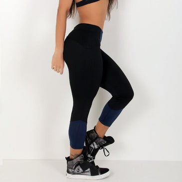 Calça legging confeccionada em poliéster liso e com detalhes em tela,Marca: Carioca FitComposição: 90% Poliéster e 10% Elastano 