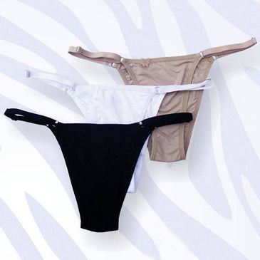 Kit composto por 3 tangas string,Cada kit contém uma unidade preta	 branca e chocolate.

Composição
%


 
 


 
 


 
 

 