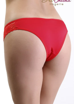 Calça microfibra com toda lateral em renda, viés de microfibra cinta e perna, laço frontal. Composição 83% poliamida 17% elastano forro 100% algodão 