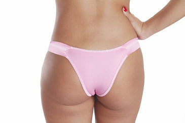 TANGA FLUFLU POA CONFECCIONADA EM MICROFIBRA, FLUFLU NA LATERAL, LAÇOS DE CETIM E ACABAMENTO EM ELÁSTICO POA.CUIDADOS:-Não alvejar;-Não deixar de molho;-Não passar;-Usar sabão neutro: 