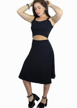 Descrição Breve:Conjunto composto por cropped duplo com alcinha e saia midi com modelagem extra godê.Produto de Excelente Qualidade com Modelagem dentro dos Padrões Brasileiros.Medida de... 