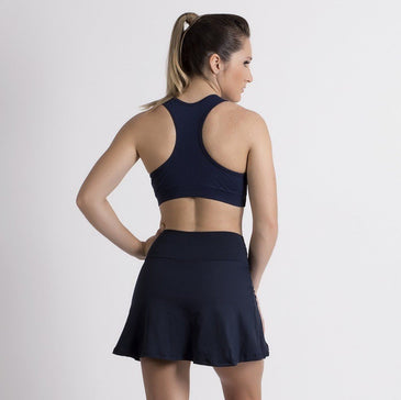 Short Saia com cós médio e um comprimento que proporciona segurança na hora de malhar. Foi desenvolvida para dar maior conforto nas atividades físicas e se... 
