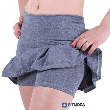 Short Saia fabricado em suplex de qualidade com cós de altura média e babadinho na barra. Short embutido na saia. Você linda de saia e super... 