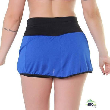 Short Saia Dry com bolsos em tecido dry de poliéster.Fabricante: FitmodaComposição: Saia: 100% Poliéster                   Short: 90% Poliéster... 