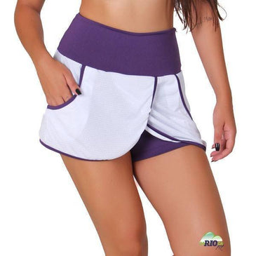 Short Saia Dry de poliéster.Marca: Carioca FitComposição short de baixo: 90% Poliéster 10% Elastano Composição da Sainha: 100% Poliéster 