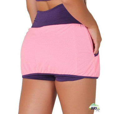 Short Saia Dry Fit de poliéster com bolsos.Marca: Carioca FitComposição short de baixo: 90% Poliéster 10% Elastano Composição da Sainha: 100% Poliéster 