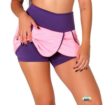 Short Saia Dry Fit de poliéster com bolsos.Marca: Carioca FitComposição short de baixo: 90% Poliéster 10% Elastano Composição da Sainha: 100% Poliéster 